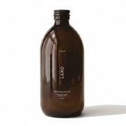 Brown bottle labeled 'LARO' on a beige background