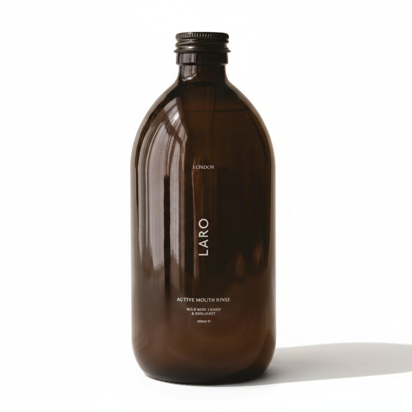 Brown bottle labeled 'LARO' on a beige background