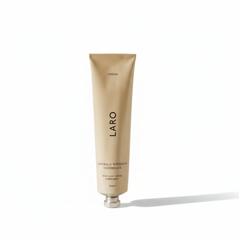 Tube of Laro toothpaste on a beige background