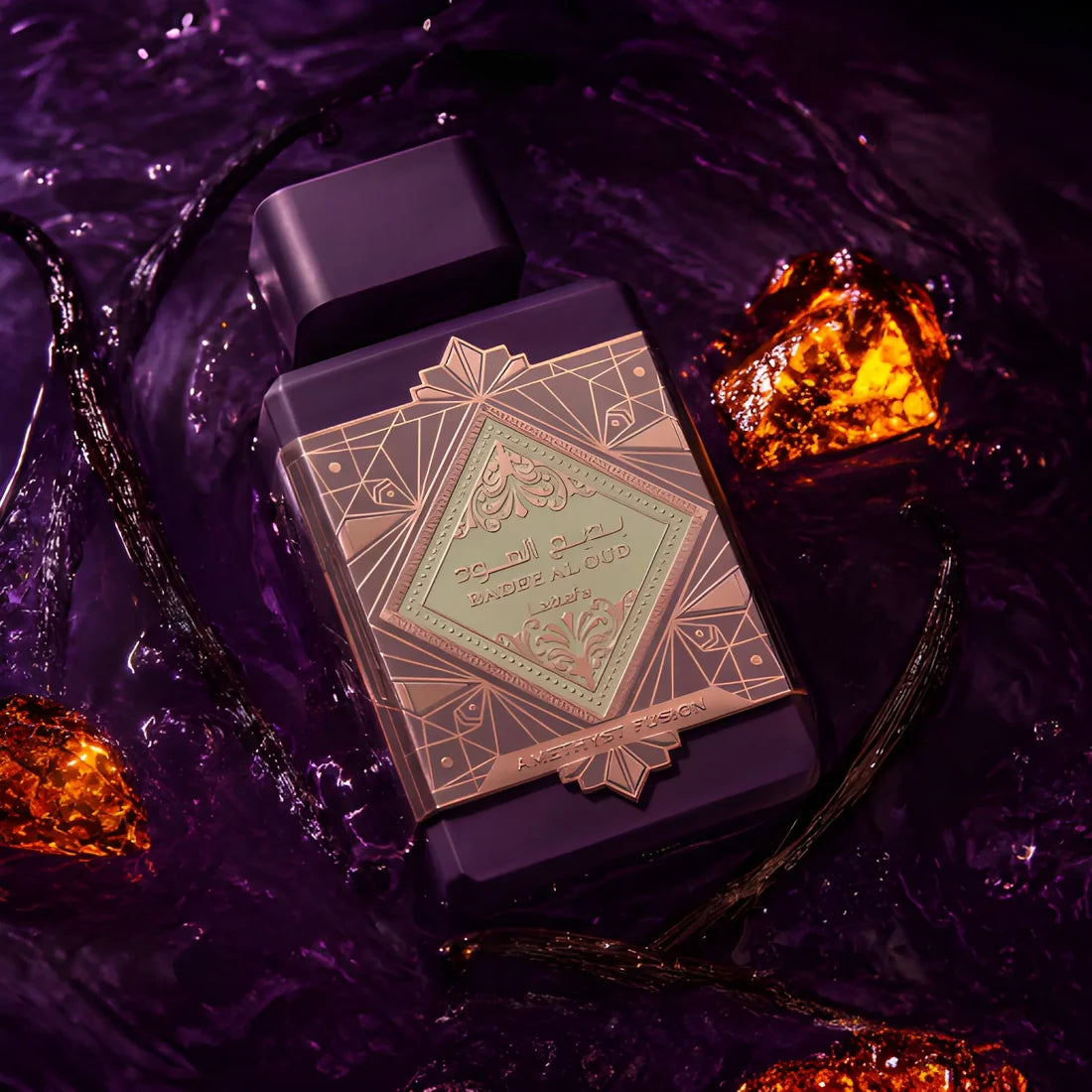 Lifestyle image of Lattafa Badee Al Oud Amethyst Fusion Eau De Parfum with rich amber accents and vanilla pods.
