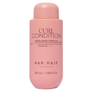 Front view of NAK Hair Curl Condition 350ml silicone-free vegan conditioner in a pink bottle for hydrating, smoothing and defining curls