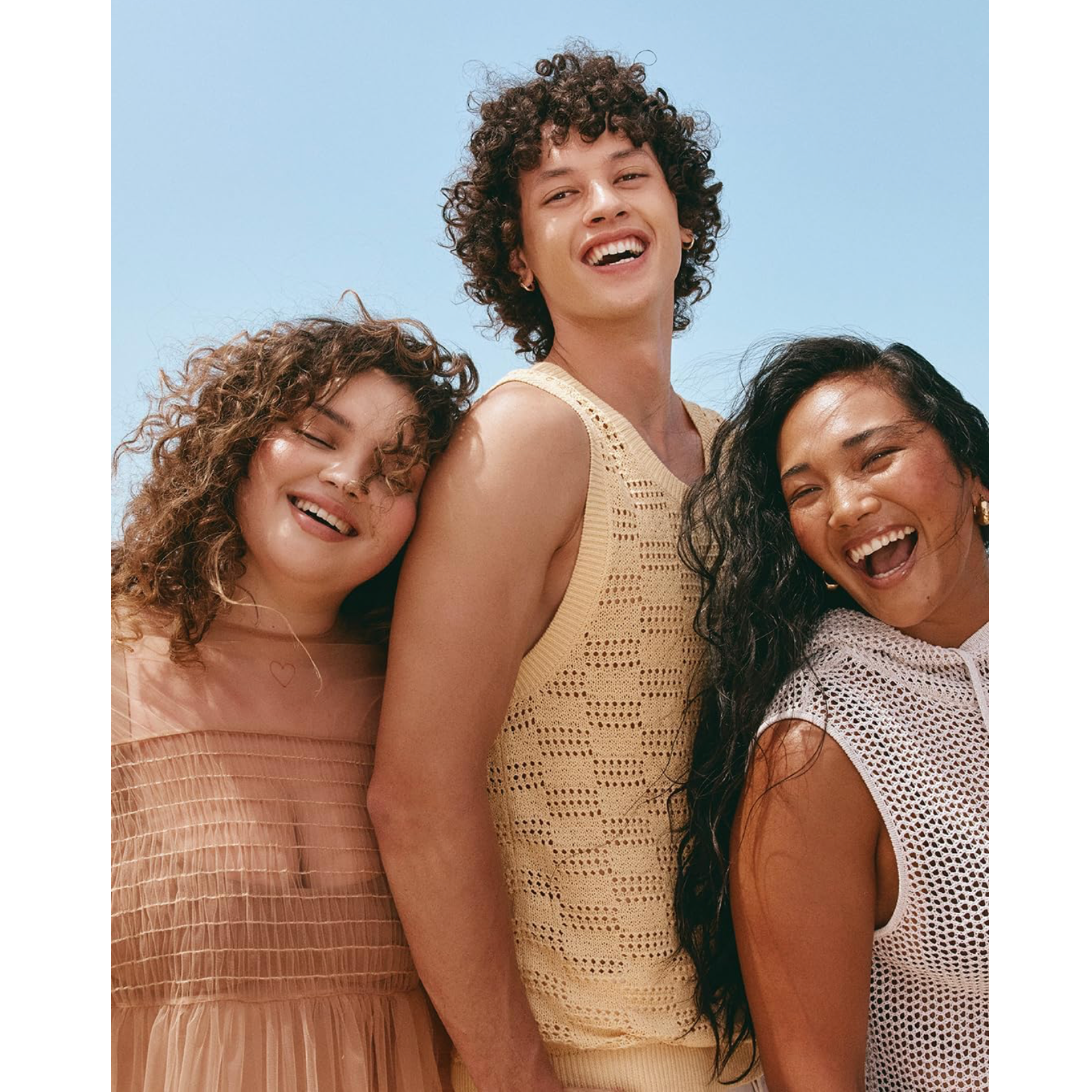 Three models with curly and wavy hairstyles representing the varied hair textures suitable for NAK Hair Curl Condition 350ml