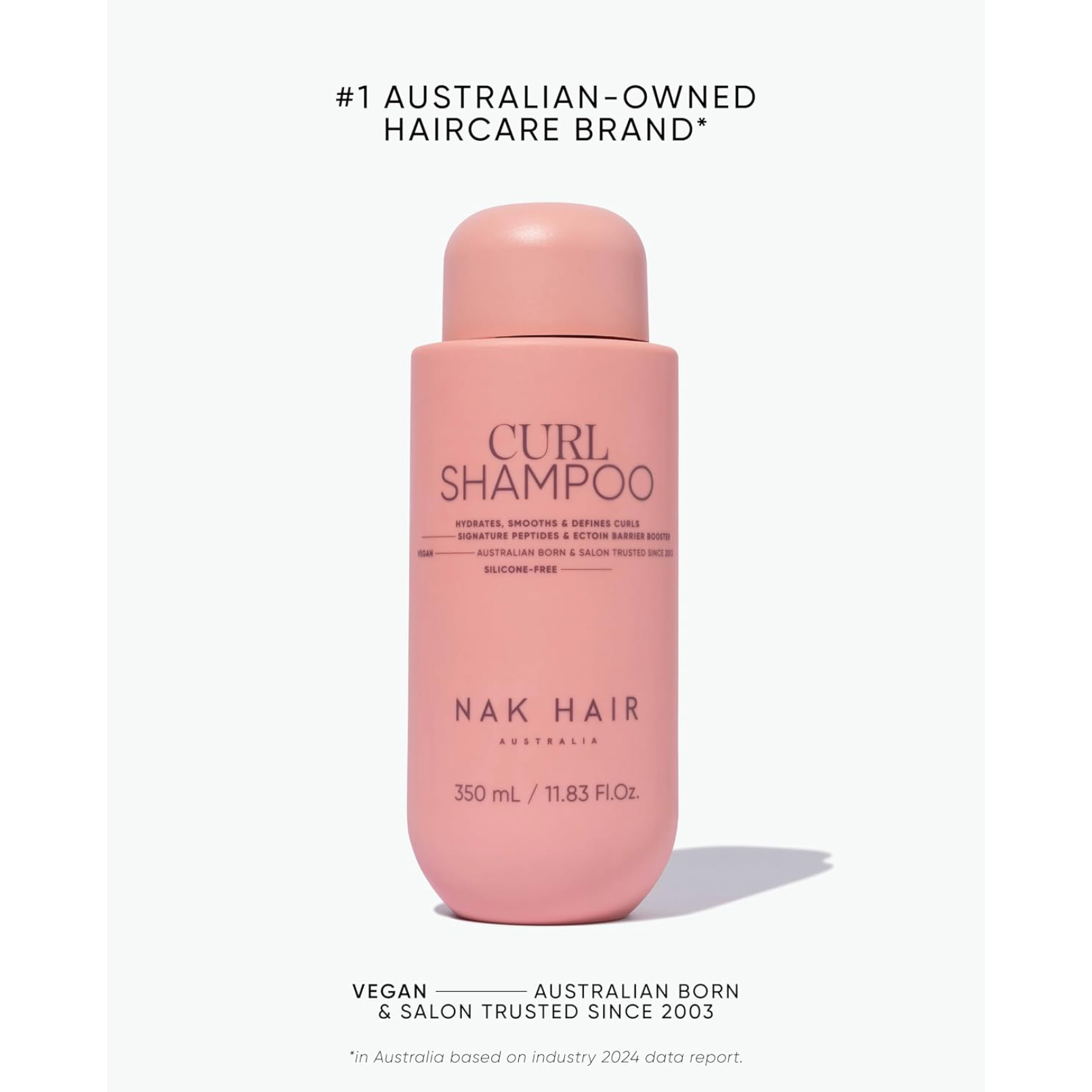 NAK Hair Curl Shampoo 350ml pink bottle, an Australian-born vegan curl cleanser with signature peptides and Ectoin Barrier Booster
