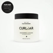 Curl Activator jar with black lid on a white background, featuring Marie Claire Hair Awards 2026 winner badge.