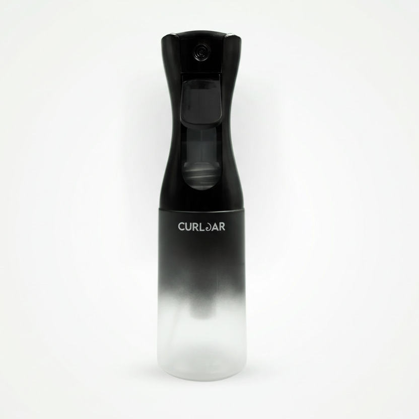 Black and white misting spray bottle with 'Curljar' branding on a white background