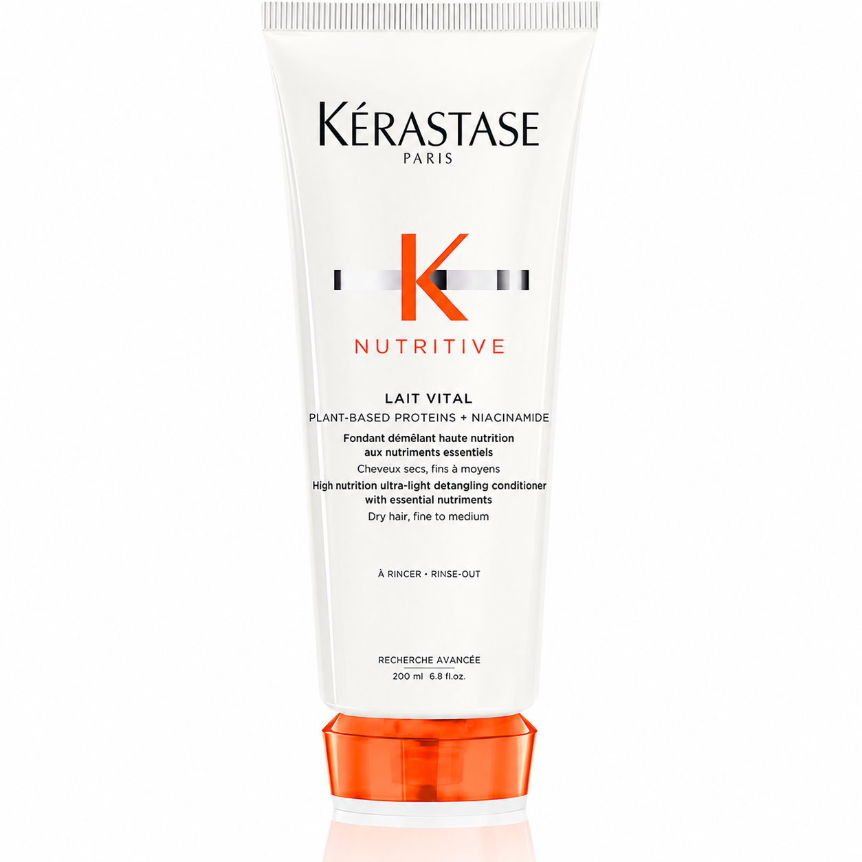 Kérastase Nutritive Lait Vital 200ml white conditioner tube with orange cap on white, designed to nourish and detangle dry, fine hair.