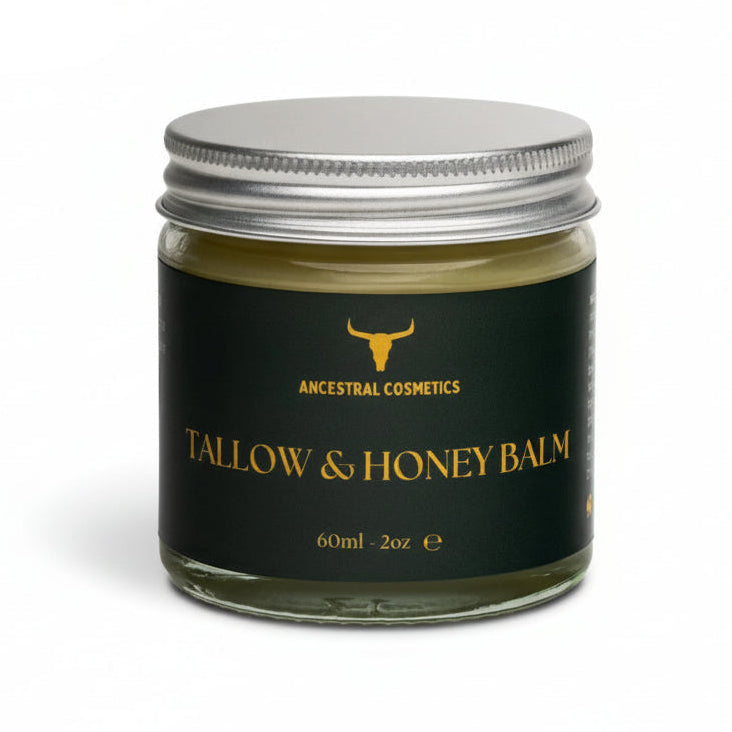 Jar of tallow and honey balm with &