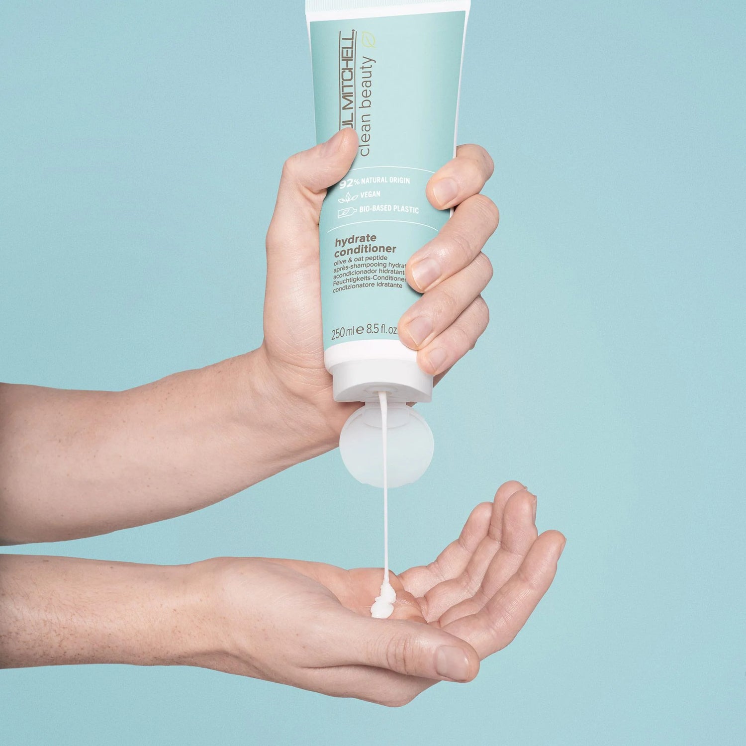 Paul Mitchell Clean Beauty Hydrate Conditioner 250ml product squeezed out into hand