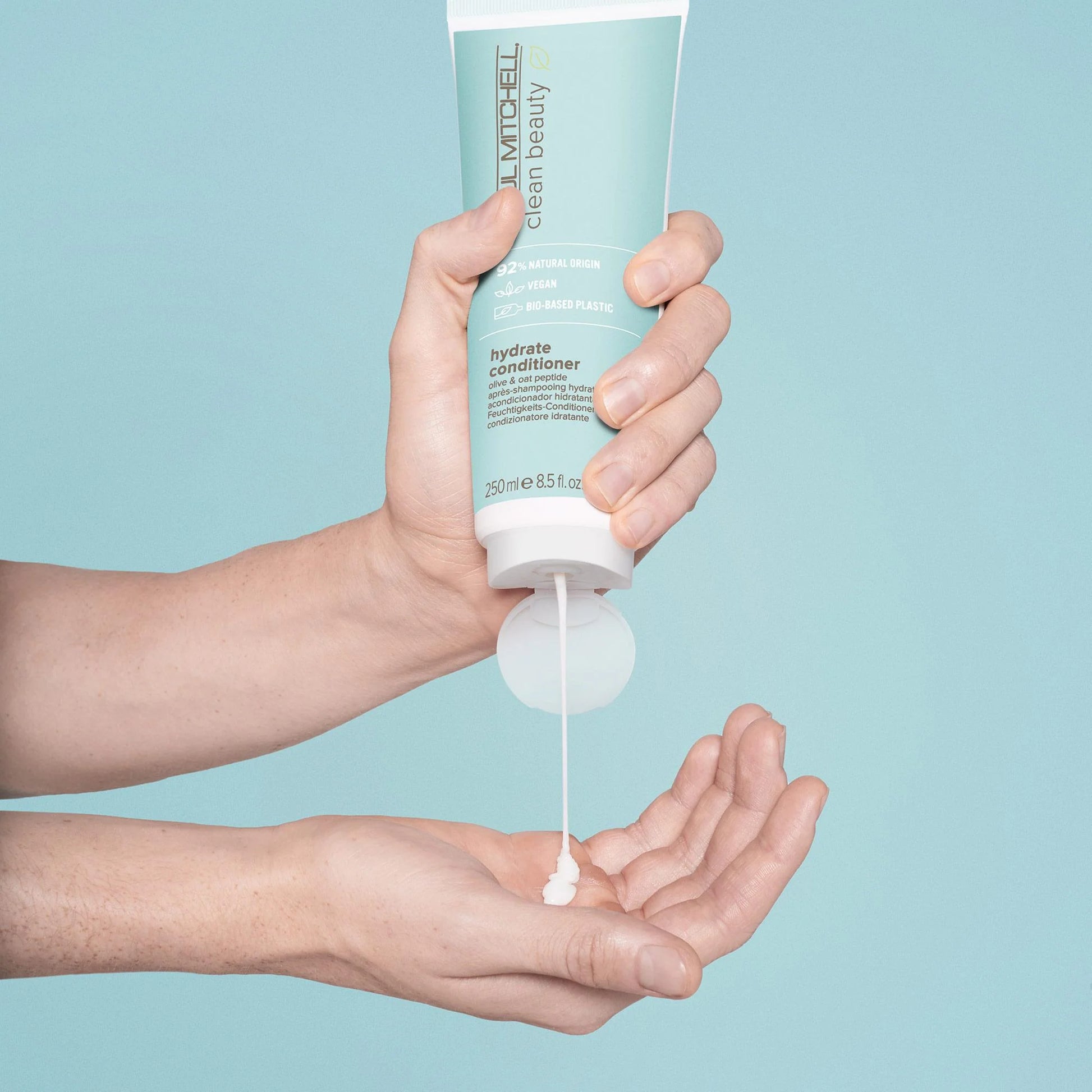 Paul Mitchell Clean Beauty Hydrate Conditioner 250ml product squeezed out into hand