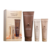 Innersense radiant skin ceremony body care products including a box, scrub, lotion, and wash on a white background