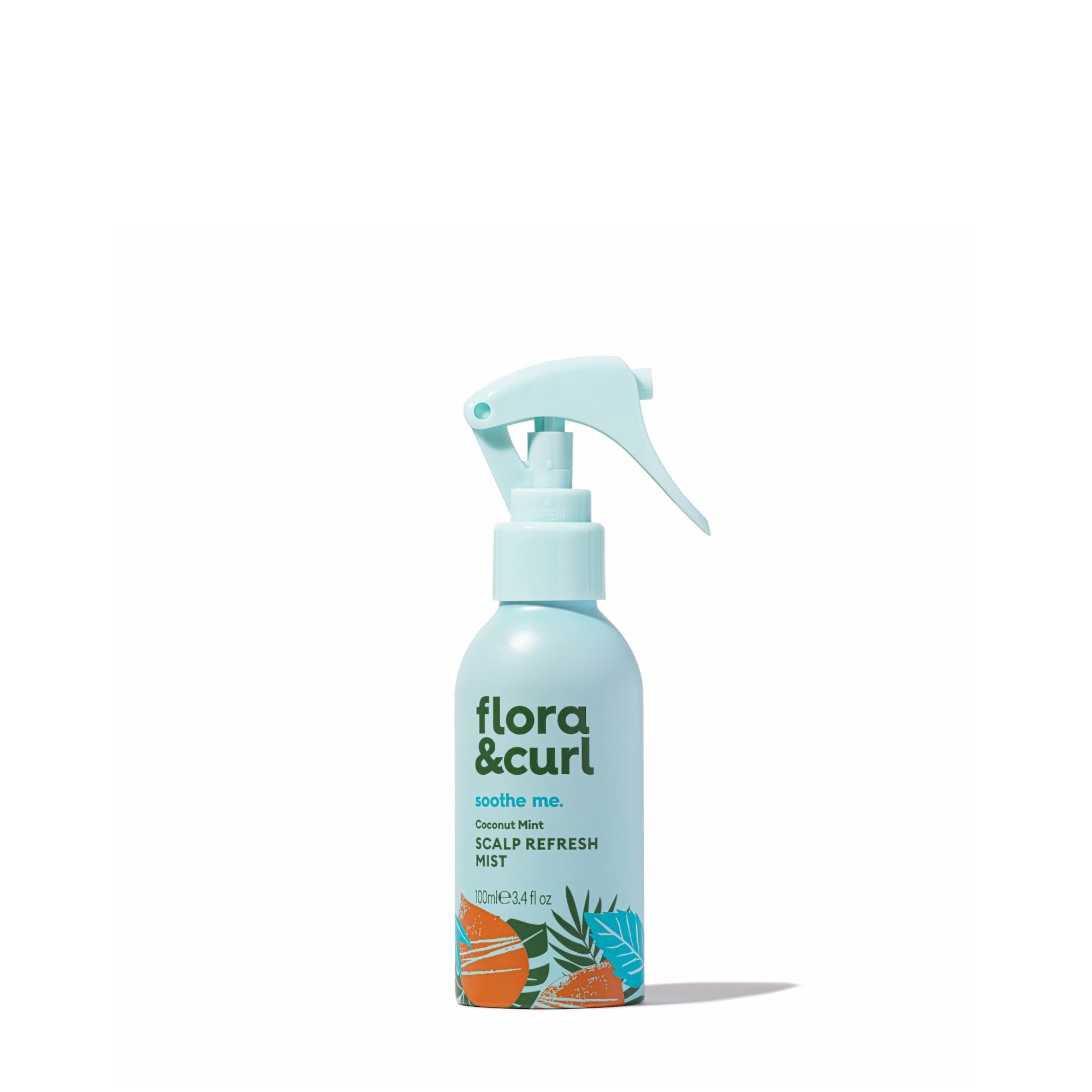 A clear spray bottle labeled Flora & Curl Coconut Mint Scalp Refresh Mist, with a floral design on the label.