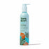 Flora & Curl conditioner bottle with tropical leaf design on a white background