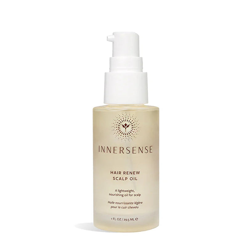A bottle of InnerSense Hair Renew Scalp Oil with a white pump dispenser and a frosted beige bottle, shown on a clean white background.
