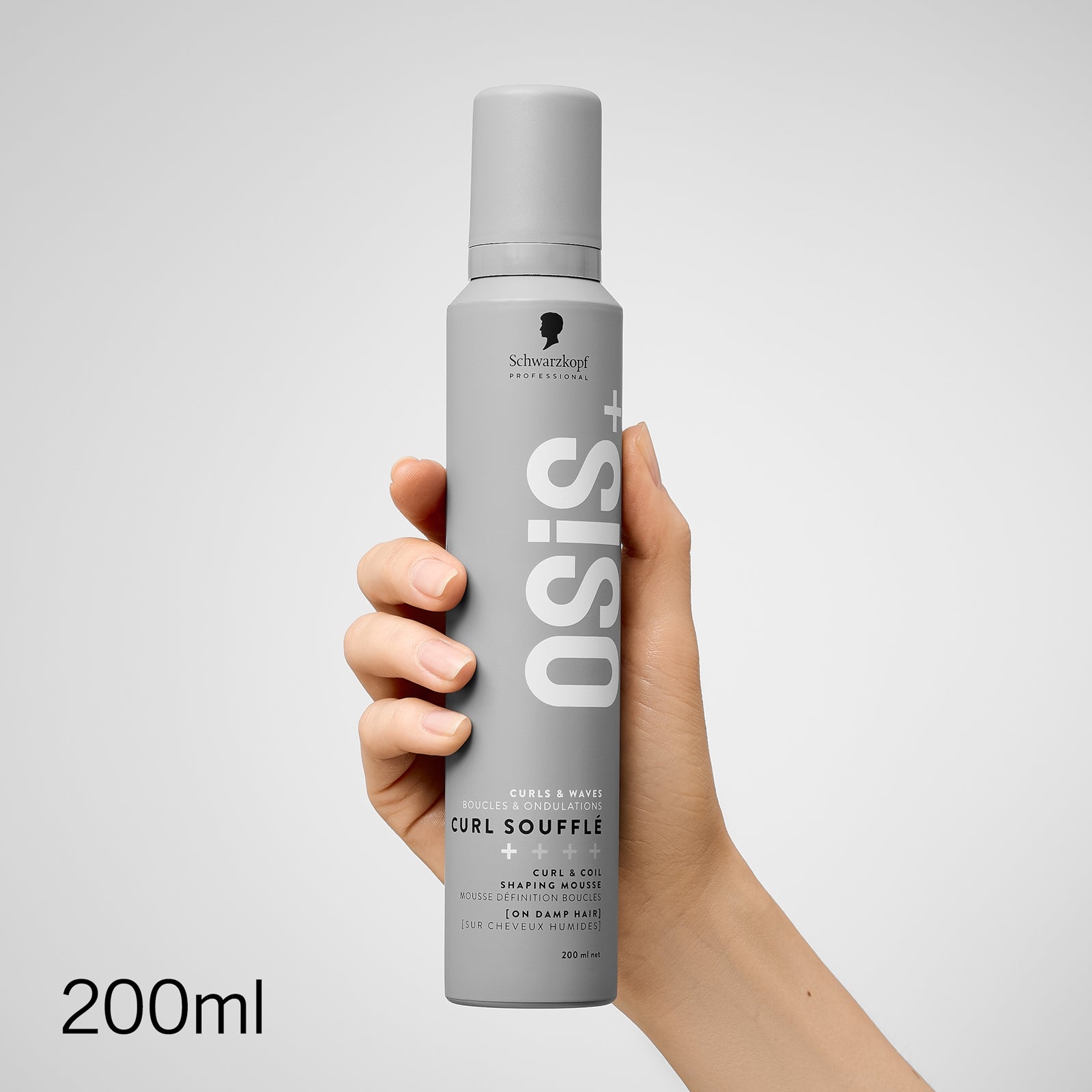 hand holding Schwarzkopf Professional Osis Curl Souffle Shaping Mousse 200ml