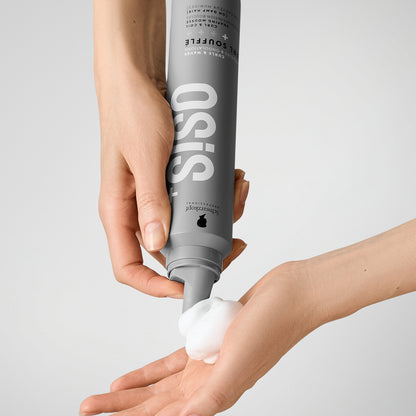 Hand using Schwarzkopf Professional Osis Curl Souffle Shaping Mousse 200ml