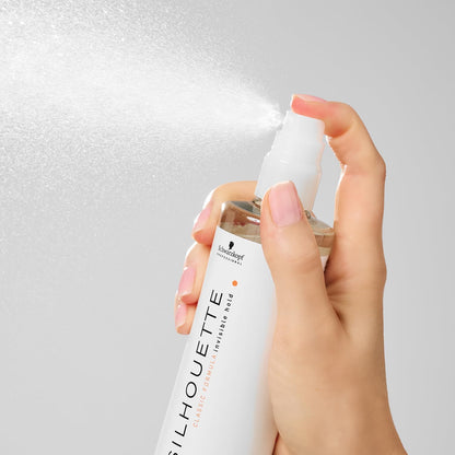 Hand spraying Schwarzkopf Professional Silhouette Style &amp; Care Lotion Flexible Hold 200ml