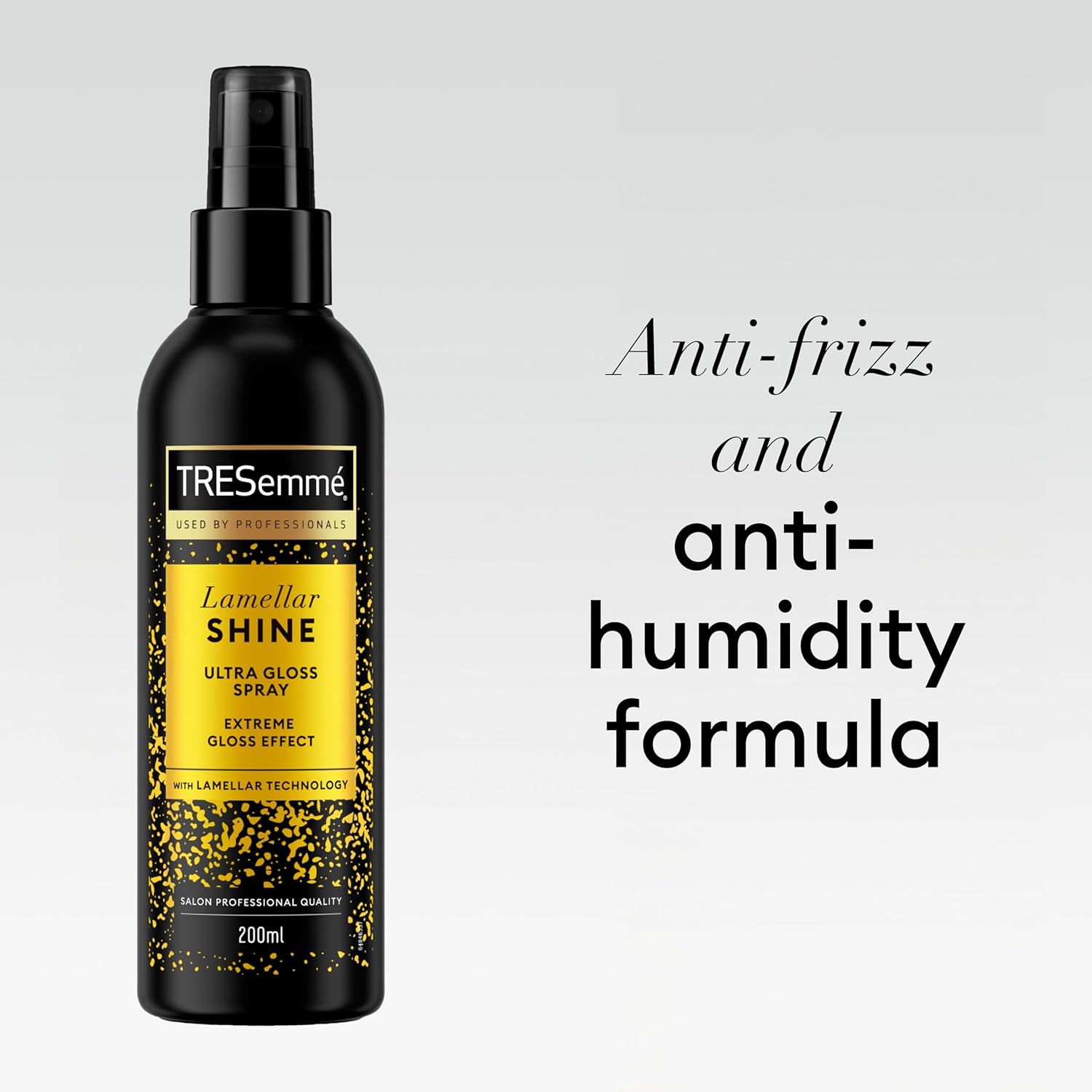 TRESemmé Lamellar Shine Ultra Gloss Spray 200ml black bottle with gold label on a light grey background, highlighting its anti-frizz and anti-humidity formula