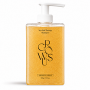 transparent amber growus sea salt therapy shampoo bottle with a white pump on a clean white background, featuring a sea salt-infused formula with visible exfoliating particles.