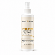 bask & lather hydrating mist 236ml in a white spray bottle, formulated to detangle hair, refresh curls, protect styles, and help soothe an itchy scalp. displayed on a clean white background.
