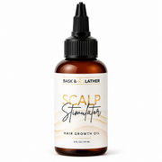 bask & lather scalp stimulator hair growth oil 59ml in an amber applicator bottle, formulated with rosemary and botanical oils to nourish the scalp, support a healthy scalp barrier, and help promote stronger, healthier-looking hair. displayed on a clean white background.