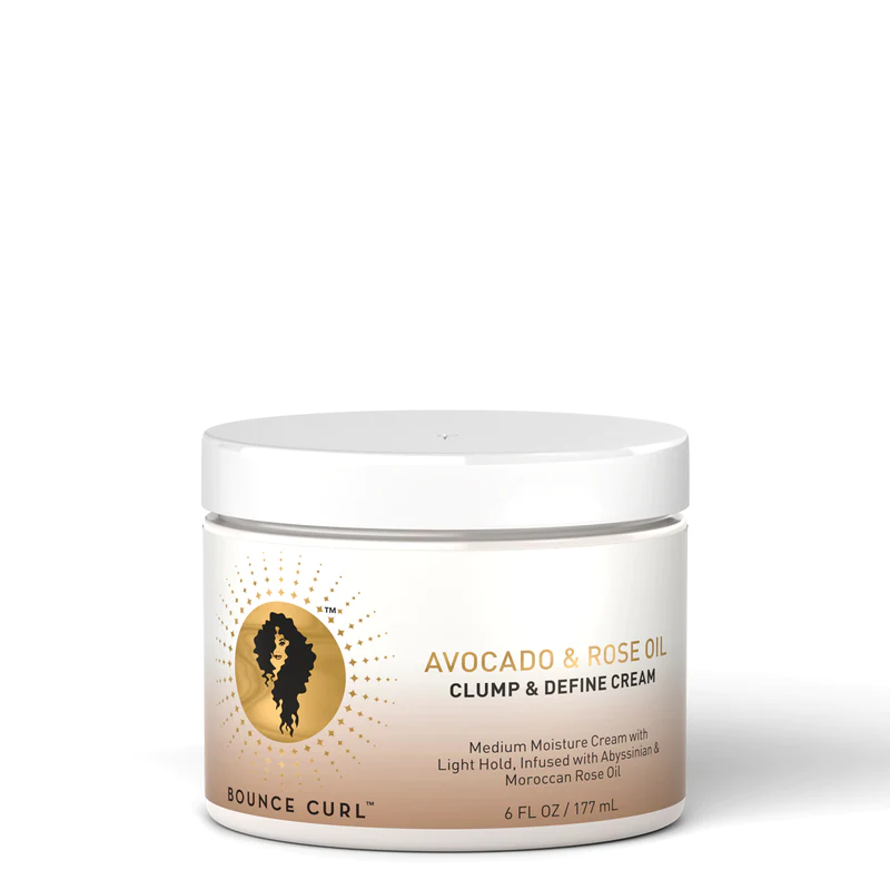 A white jar with a label that reads 'Bounce Curl Avocado & Rose Oil Clump and Define Cream 6oz'.