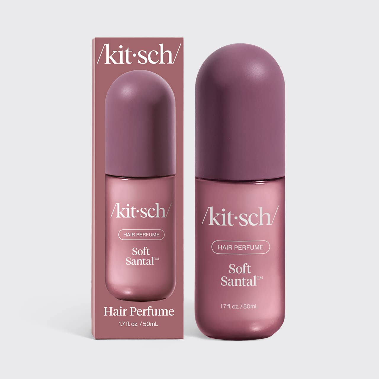 Kitsch Soft Santal hair perfume bottle and its matching retail box, both in a dusty mauve-purple color, set against a light gray background.