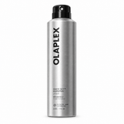 Olaplex Shape Set Hairspray in a sleek, brushed silver aerosol can with a black spray top, shown on a clean white background.