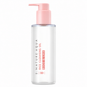 clear s.nature aqua rice cleansing oil bottle with a soft pink pump on a clean white background, featuring minimalist packaging with rice and lha branding.