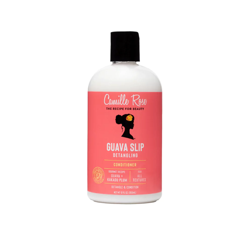 A bottle of Camille Rose Guava Slip Detangling Conditioner, 12oz, with pink label packaging.