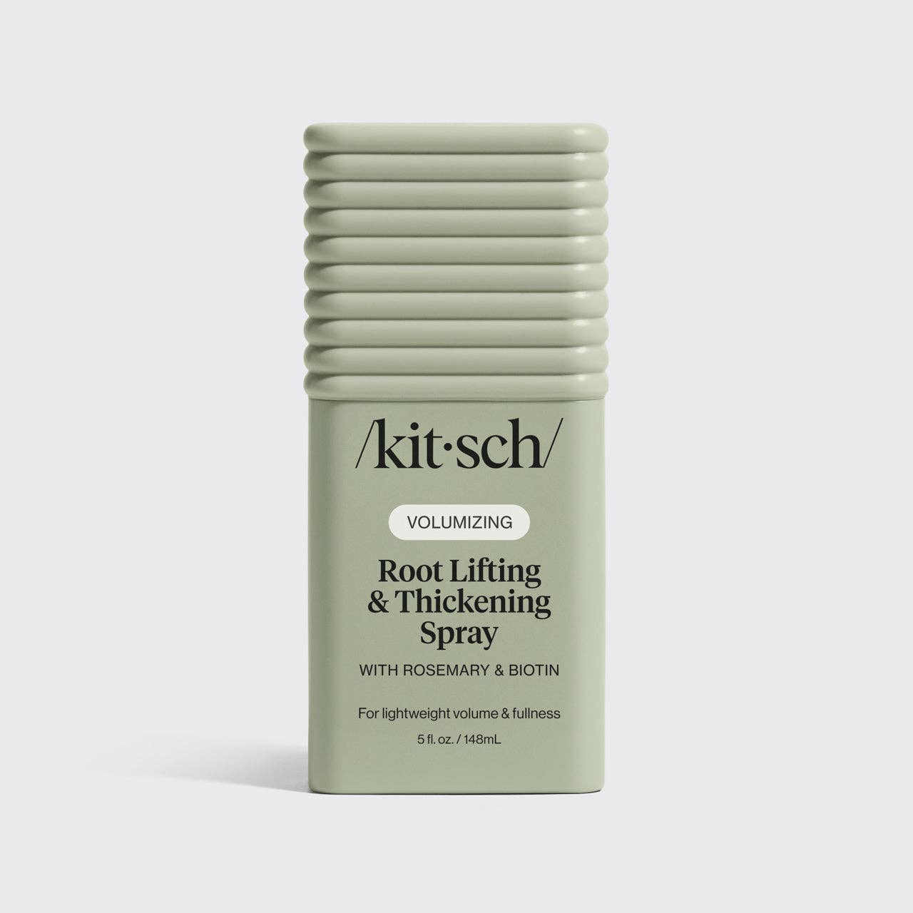 Kitsch root lifting and thickening spray bottle on a light gray background