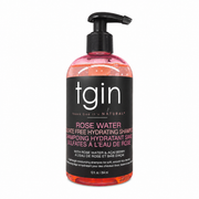 A bottle of tgin Rose Water Sulfate Free Hydrating Shampoo with a pump dispenser, predominantly pink in color.