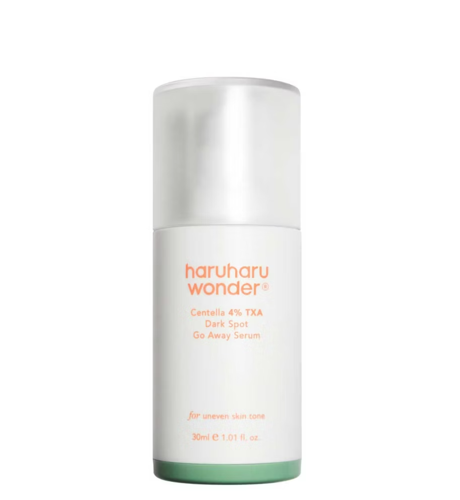 Skincare serum bottle with &