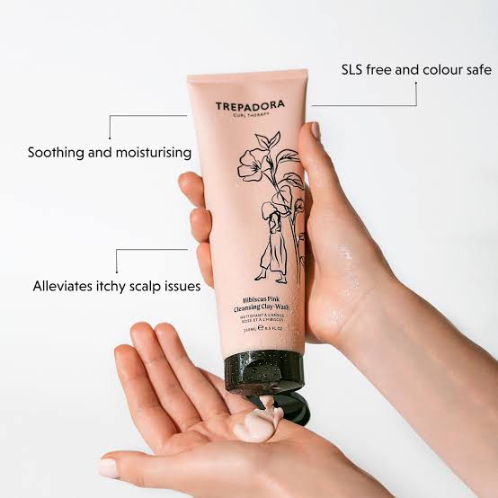 Trepadora hair care product being held with text highlighting benefits on a white background