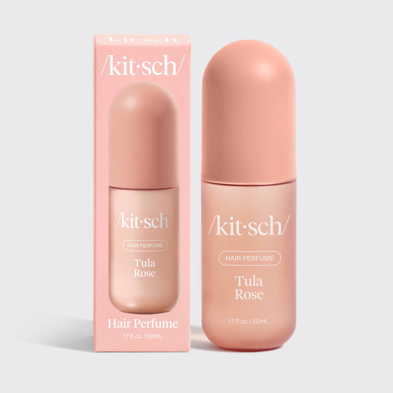 Kitsch Tula Rose hair perfume bottle and packaging on a light gray background