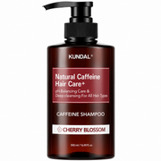 kundal natural caffeine hair care+ caffeine shampoo cherry blossom 500ml pump bottle on a white background
