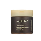 Medicube Deep Vita C Pad with a brown jar on a white background