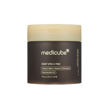 Medicube Deep Vita C Pad with a brown jar on a white background