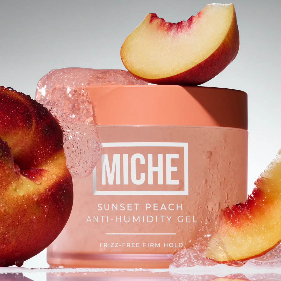 Miche Sunset Peach anti-humidity gel with peaches on a gray background