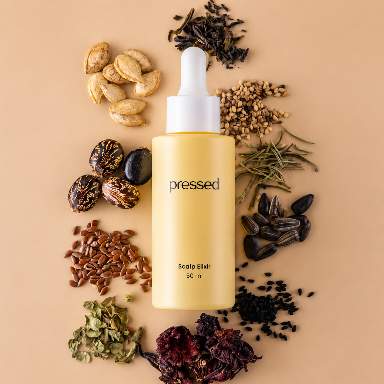 pressed scalp elixir 50ml bottle surrounded by botanical ingredients including seeds, herbs and dried flowers on a beige background