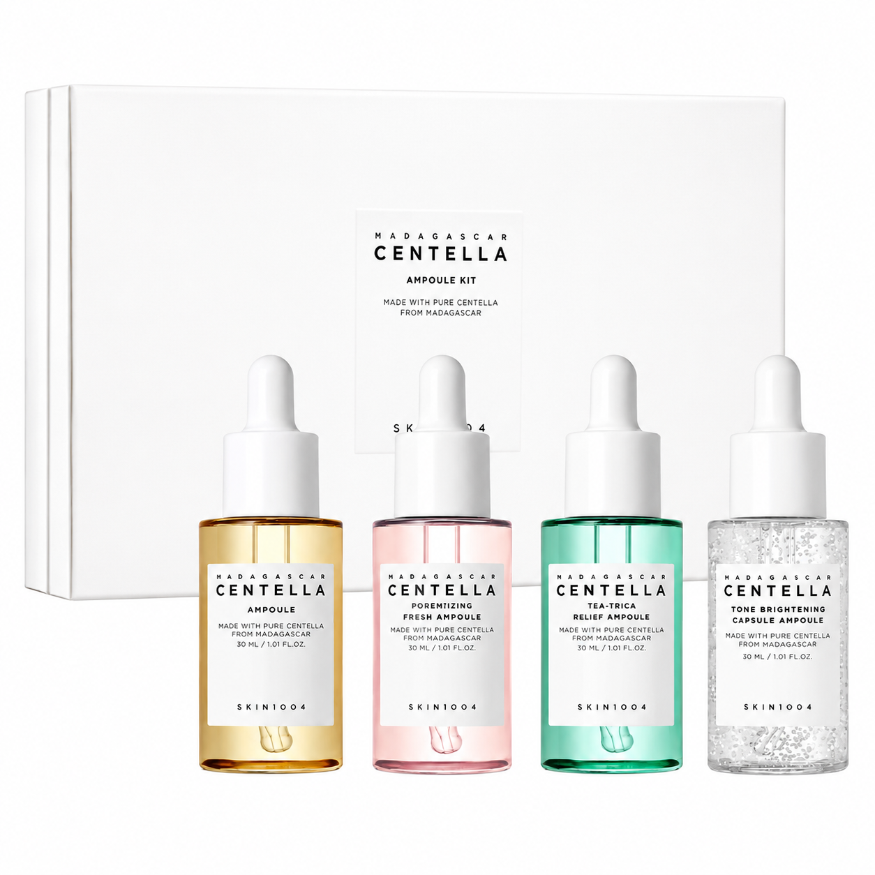skin1004 madagascar centella ampoule kit featuring four serums in a white presentation box. skincare gift set includes the original centella ampoule, poremizing fresh ampoule, tea-trica relief ampoule and tone brightening capsule ampoule to help soothe, hydrate, refine pores and brighten the complexion.