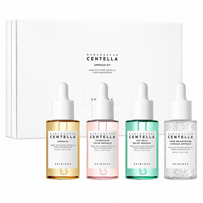 skin1004 madagascar centella ampoule kit featuring four serums in a white presentation box. skincare gift set includes the original centella ampoule, poremizing fresh ampoule, tea-trica relief ampoule and tone brightening capsule ampoule to help soothe, hydrate, refine pores and brighten the complexion.