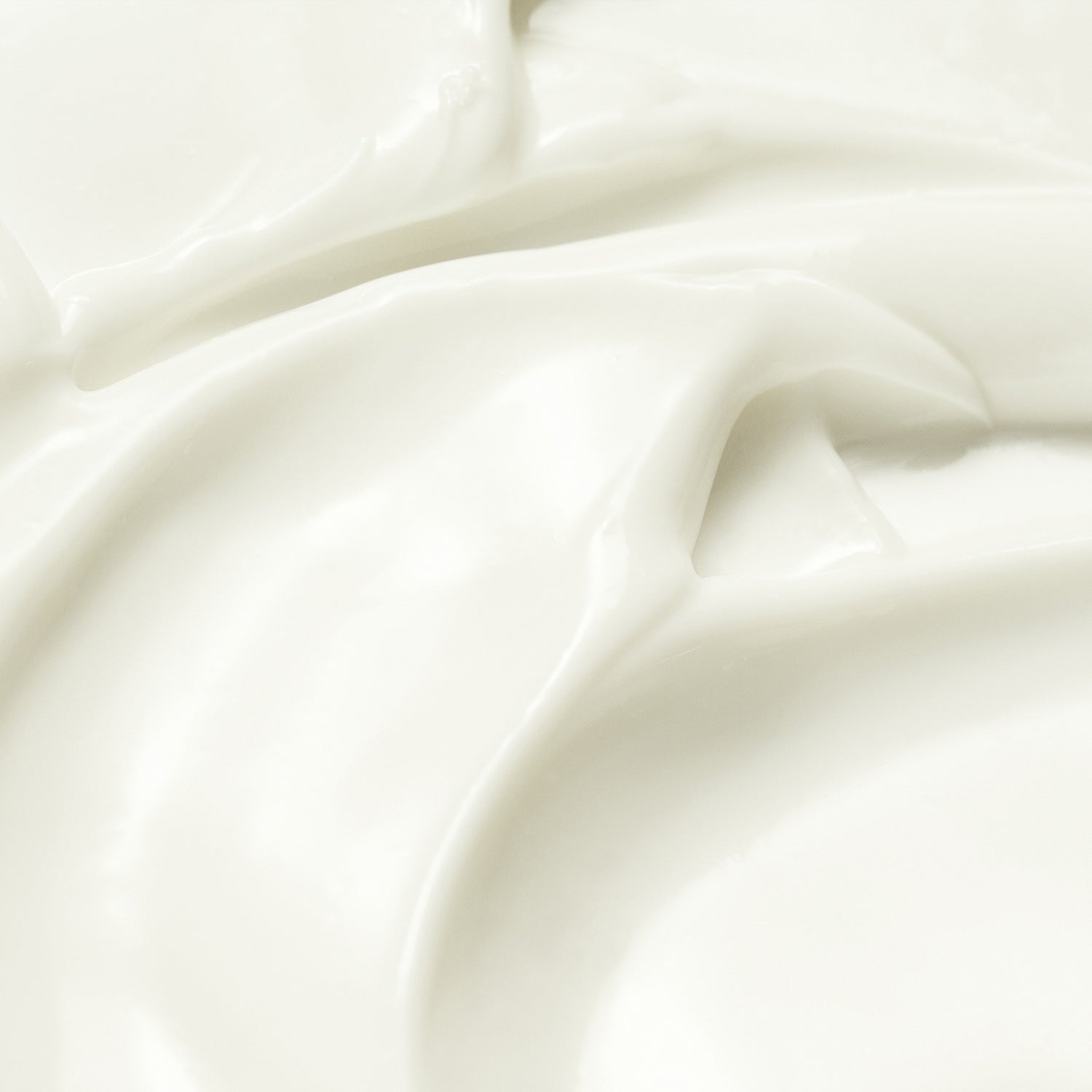 Close-up of white sun cream with folds