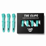 the doux the clips soft-touch sectioning clips set featuring six mint green sectioning clips in a black presentation box. designed to securely section hair during styling, cutting, colouring, and treatments while providing a comfortable, non-slip grip for all hair types.