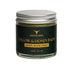 Tallow & Honey Balm jar with black label on a beige background