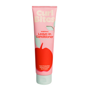 A tube of Curl Bites Weightless Leave-In Conditioner with a pink background and a picture of an apple. The text on the tube indicates that it is a leave-in conditioner and mentions apple extract.
