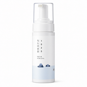 white foaming cleanser bottle with a clear pump cap and minimalist korean packaging on a clean white background.