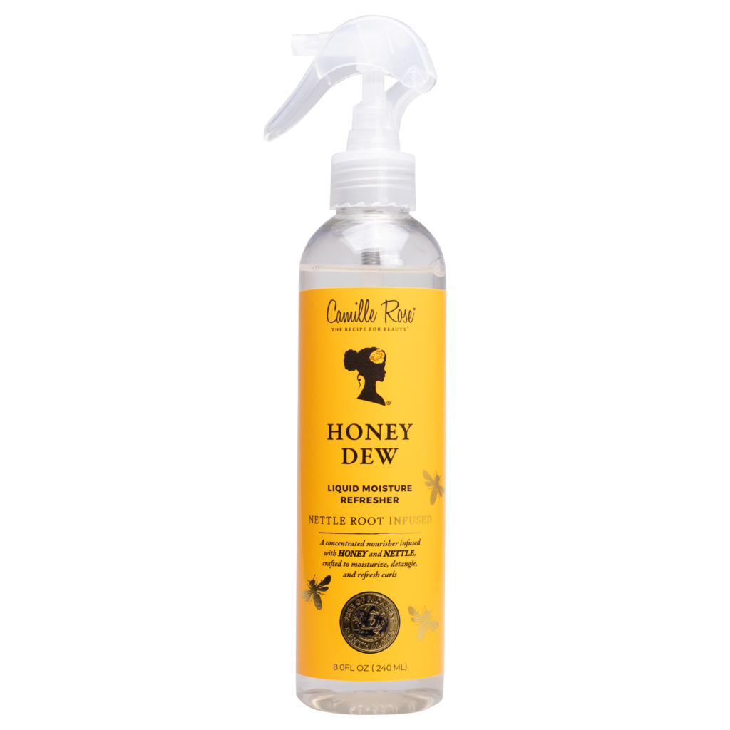 A plastic spray bottle with a white pump labeled 'Camille Rose Honey Dew Refresher 8oz' with a yellow and white color scheme.