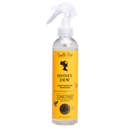 A plastic spray bottle with a white pump labeled 'Camille Rose Honey Dew Refresher 8oz' with a yellow and white color scheme.