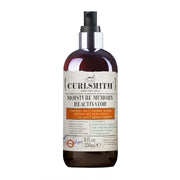 A bottle of Curlsmith Moisture Memory Reactivator, designed for hair styling and defined as vegan.
