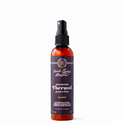 A spray bottle of Uncle Funky's Daughter Primer with maximum thermal protection, intended for use before styling to protect hair from heat damage.